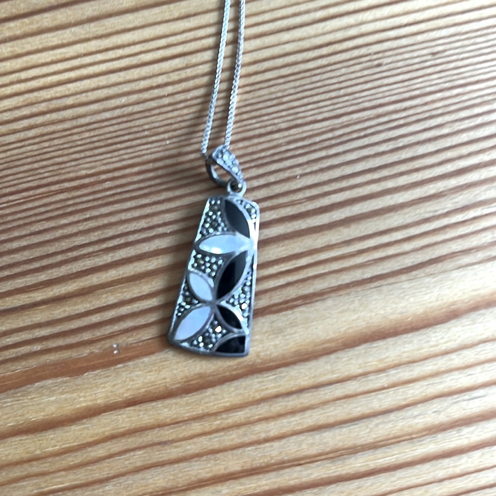 Silver, onyx, and Mother of pearl necklace